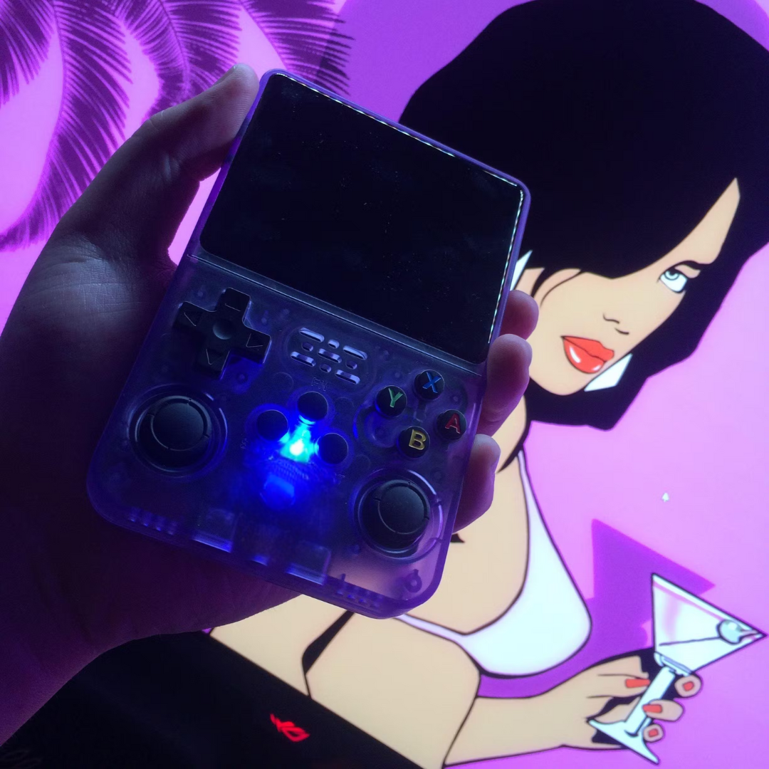 Handheld console with neon backdrop