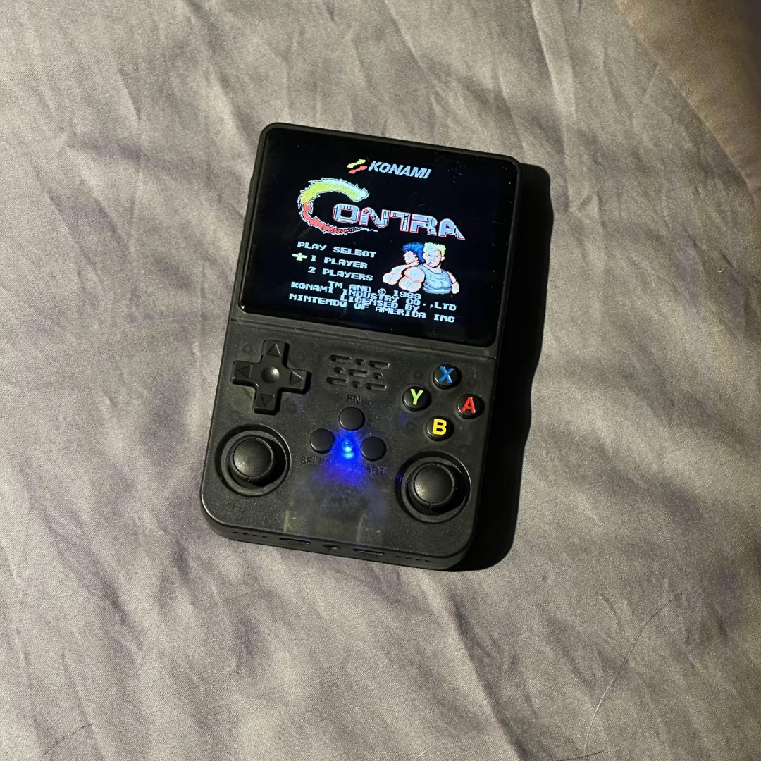 Handheld with classic game on screen